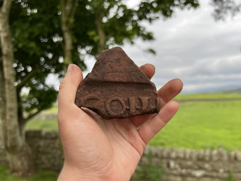 Roman tile stamped with letter COH